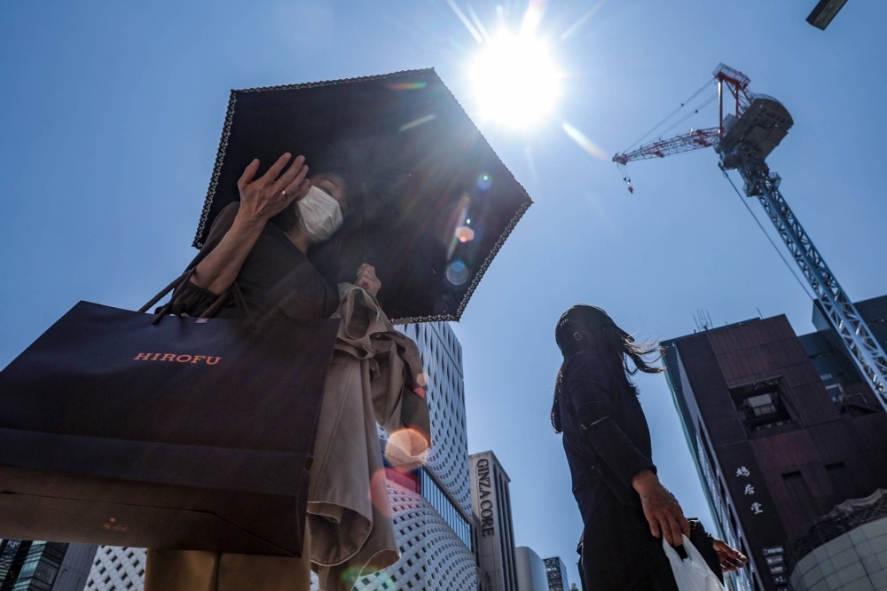 Parasols are an age-old solution to today’s crippling heat